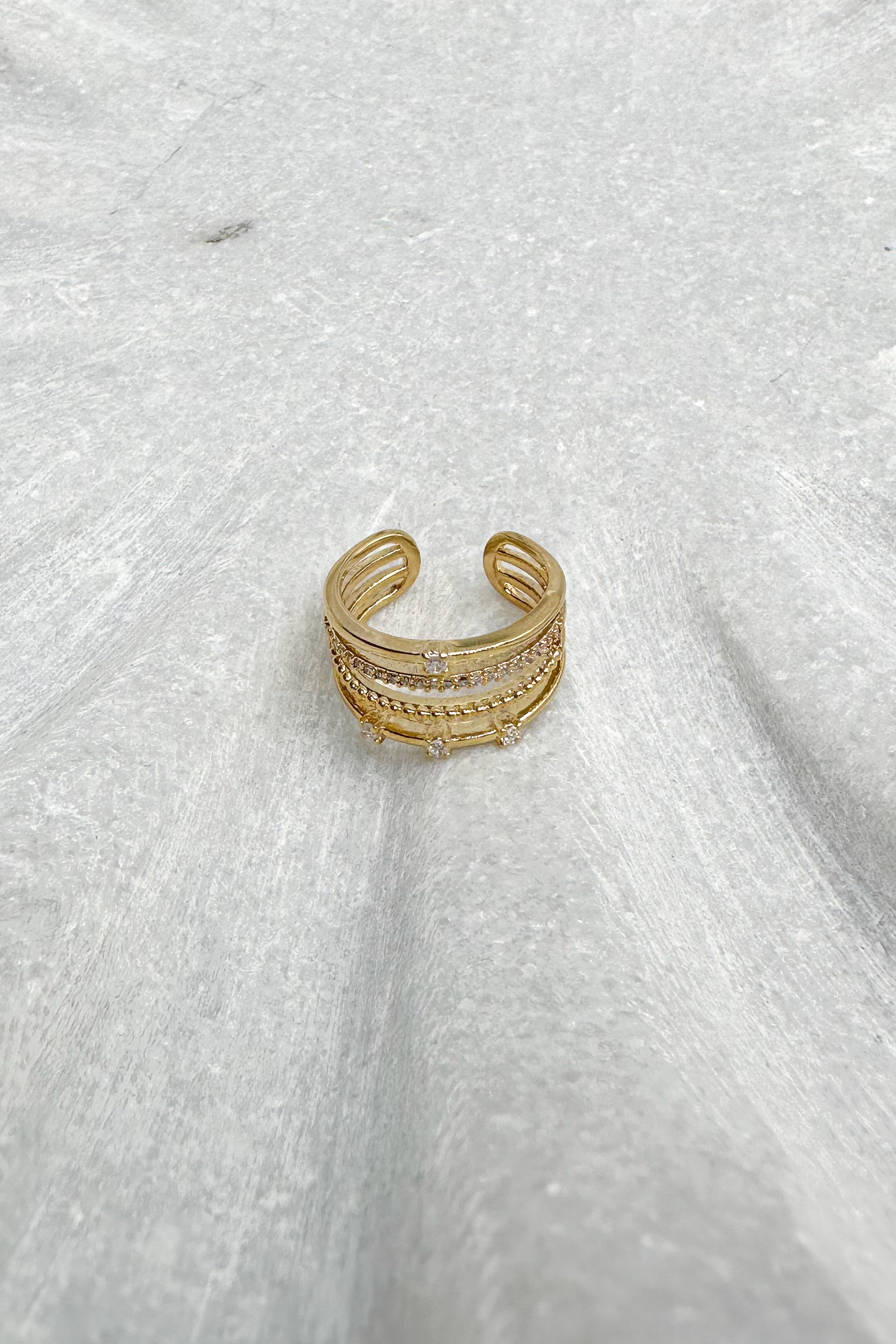 Willow Beaded & Rhinestone Layered Ring- gold -close up flat lay view