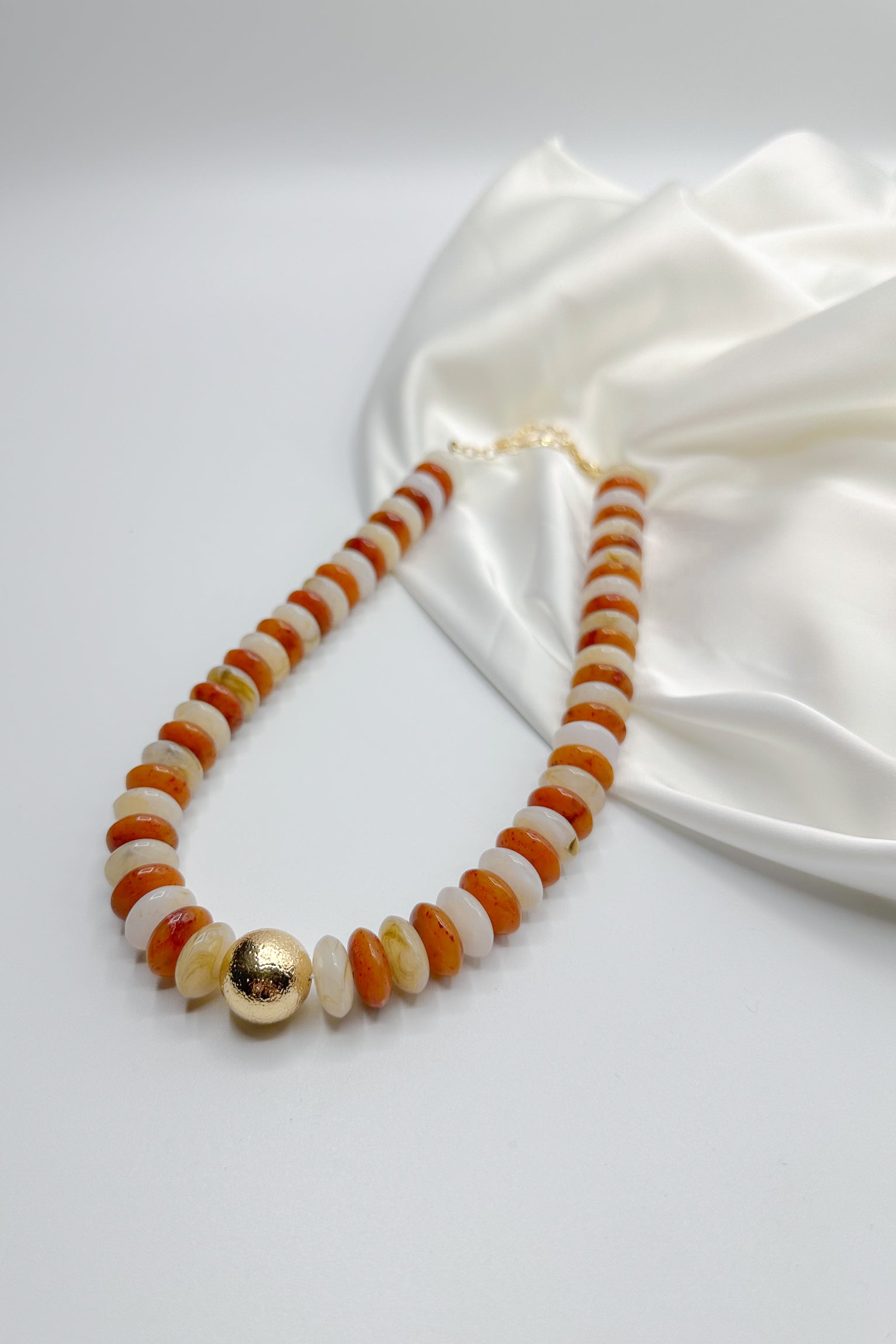 Melissa Multi & Gold Bead Necklace-ivory/rust- flat lay view