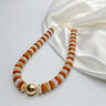 Melissa Multi & Gold Bead Necklace-ivory/rust- flat lay view