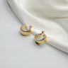 Andrea Brushed Gold Huggies Earring- close up view