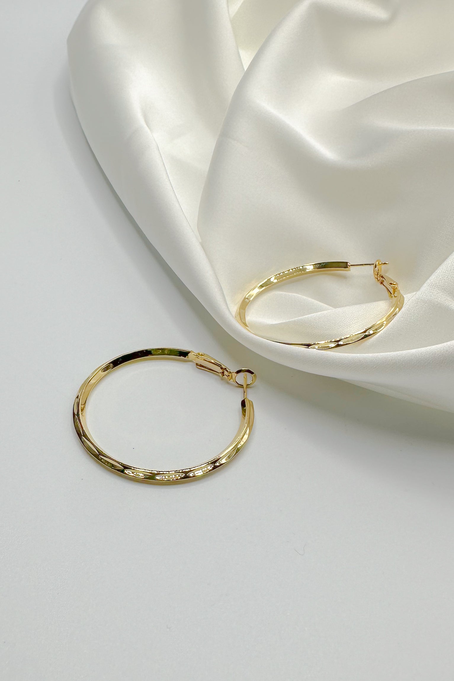 Julissa Gold Hammered Hoop Earring- close up front view