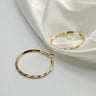 Julissa Gold Hammered Hoop Earring- close up front view