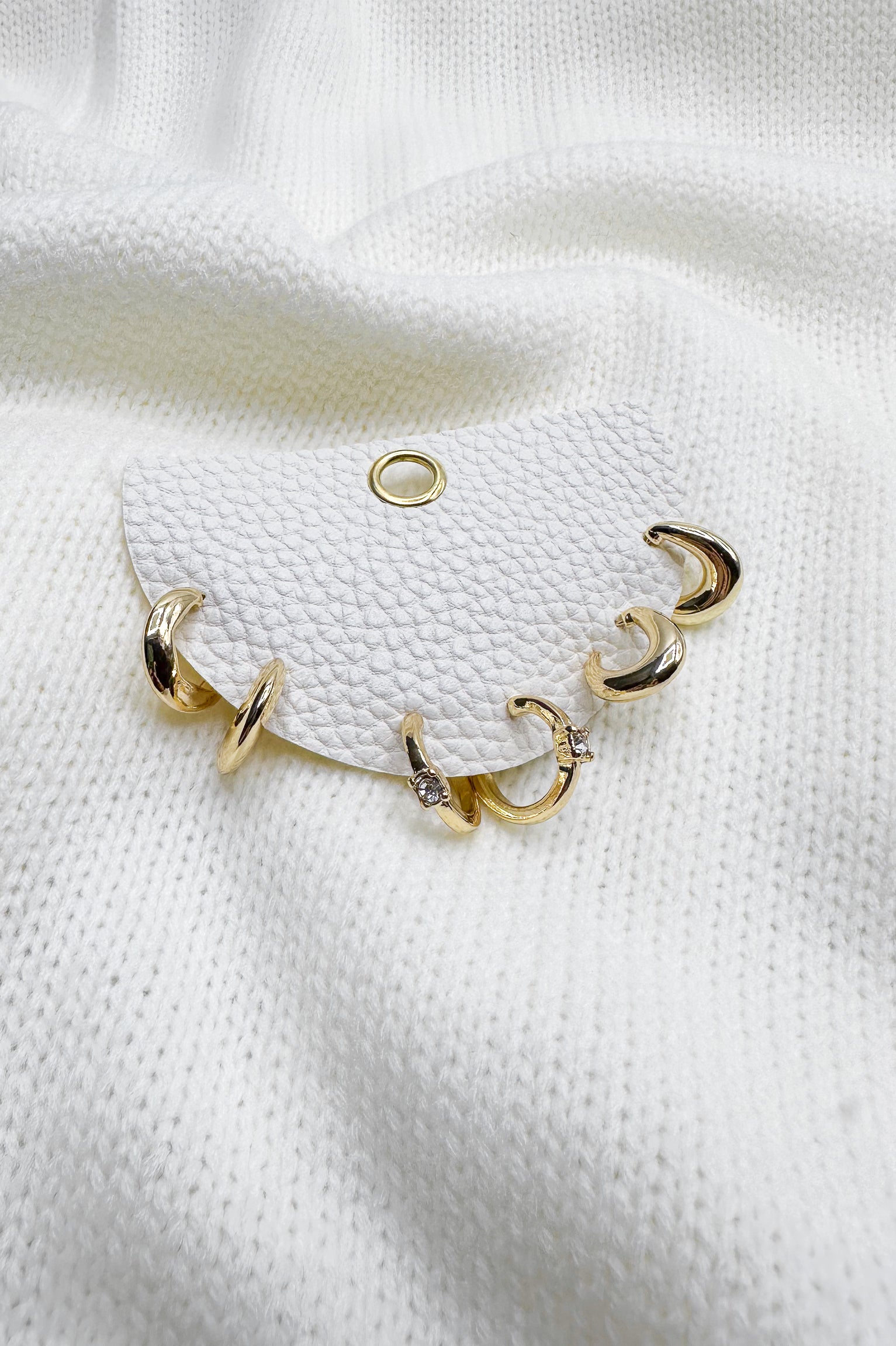 - Nila Gold Hoops Earring Set- front close up view