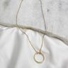 Nova Gold Open Circle Medallion Necklace-flat lay view