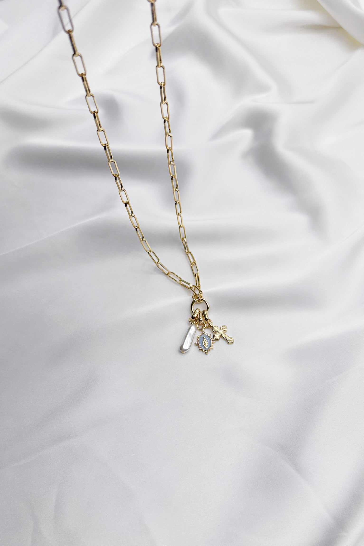 Celeste Gold Pearl & Cross Medallion Necklace- close up view