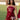 Full body front view of female model wearing the Anya Burgundy Faux-Leather Strapless Dress that has burgundy faux-leather fabric, a strapless neck, and mini-length hem.