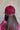 Back view of model wearing the Breast Cancer Gear: You Can Do It Trucker Hat that has a burgundy bill and back, a snapback, pink trim, and a cream front with an embroidered pink and burgundy graphic. 