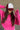 Front view of model wearing the Breast Cancer Gear: You Can Do It Trucker Hat that has a burgundy bill and back, a snapback, pink trim, and a cream front with an embroidered pink and burgundy graphic. 