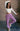Full body view of model wearing the Myla Vintage Purple Drawstring Jogger Pants which features light purple waffle knit fabric, two front pockets, an elastic waistband with drawstring ties, and jogger pant legs with thick hem.