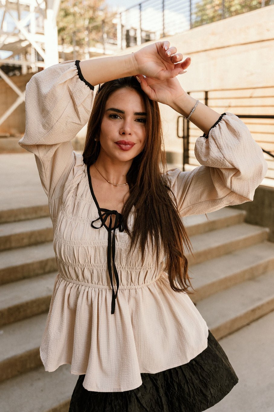 Valeria Natural & Black Tie Peplum Top- close up front view