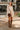 Shannon Beige Lace Mini Dress - full body front view (model holding purse)