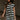 Front view of model wearing the Esme Black & Cream Striped Dress which features black and cream ribbed fabric, striped pattern, mini length, two side pockets, round neckline and short sleeves.