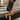 Full body view of model wearing the Brielle Black Sequin Fringe Mini Dress which features black sheer fabric, black lining, mini length, black sequin fringe details, scooped neckline, adjustable straps, sleeveless and monochrome back zippper with hook clo