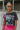 Front view of model wearing the Bob Dylan Cropped Graphic Tee, which features charcoal knit fabric, a round neckline, and short sleeves.