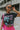 Front view of model wearing the Bob Dylan Cropped Graphic Tee, which features charcoal knit fabric, a round neckline, and short sleeves.