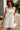 Leighton White Flare Mini Dress- close up front view