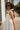Leighton White Flare Mini Dress- close up side view