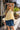 Arianna Yellow Pleated Flare Sleeveless Top- frontal view