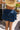 Helena Dark Wash Tiered Denim Mini Skirt - back view