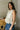 Faye White & Yellow Floral Pleated Peplum Tank- frontal side view