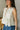 Faye White & Yellow Floral Pleated Peplum Tank- close up side view