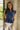 Bellamy Navy Peplum Ruffle Sleeveless Top- close up front view
