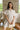 Rayna Latte & White Stripe Pleated Mini Dress- front close up view
