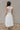 Myla White Dropped Waist Midi Dress- full body back view