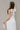 Myla White Dropped Waist Midi Dress- close up back view