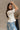 Dahlia White Stitch Lace V-Neckline Top- side view