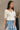 Dahlia White Stitch Lace V-Neckline Top- frontal side view
