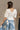 Dahlia White Stitch Lace V-Neckline Top- close up back view