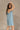 Avery Washed Denim Fray Mini Dress- full body side view