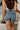 Ariana Medium Wash Denim Skort - close up back view