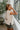 Rima Cream Sleeveless Sweater - side view