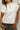 Lea Cream Criss-Cross Sleeveless Sweater - close up of fabric 
