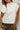 Lea Cream Criss-Cross Sleeveless Sweater - close up of fabric 