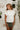 Lea Cream Criss-Cross Sleeveless Sweater - frontal view