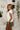 Lea Cream Criss-Cross Sleeveless Sweater - side view