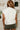 Lea Cream Criss-Cross Sleeveless Sweater - close back view