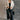 Full body front view of model wearing the view of model wearing the Piper Off White Sherpa & Corduroy Jacket that has sherpa fabric, corduroy details, front snaps with a zipper, a high neck, pockets, and long sleeves.