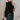 Front view of model wearing the Miley Black Rhinestone Faux Leather Mini Skirt which features black faux leather fabric, black lining, mini length, rhinestone embellishments, and a monochromatic side zipper with a hook closure.