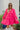 Frontal view of the Wide Open Spaces Mini Dress that features a hot pink material, a round neck with a ruffle trim, a 3/4 button-up front, a long sleeve, a tiered babydoll design, and a flowy fit.