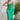 Frontal view of the Call You Mine Midi Dress In Green that features a green colored silk material, a cowl neckline, a sleeveless design with thin adjustable straps, a side slit, and a midi length.