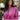Front view of model waring The Blake Cropped Sweatshirt In Purple features knit fabric with a soft fleece interior, a round neckline, long batwing sleeves, and a wide cropped fit
