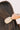 Mini Detangler Hair Brush For Medium Hair in Tan- close up hair back view