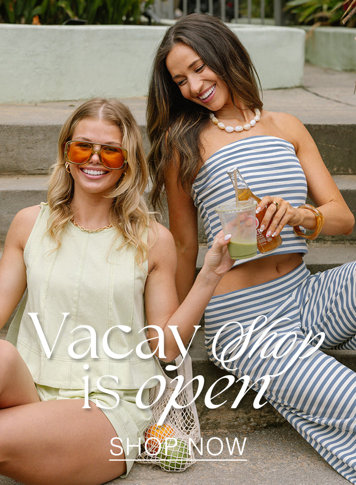 model wearing green set & model wearing blue striped set