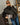 model_wearing_brown_jacket