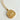 Close-up image of the Taurus Zodiac Gold Coin Necklace that has a bull on the coin. Shown against white background.