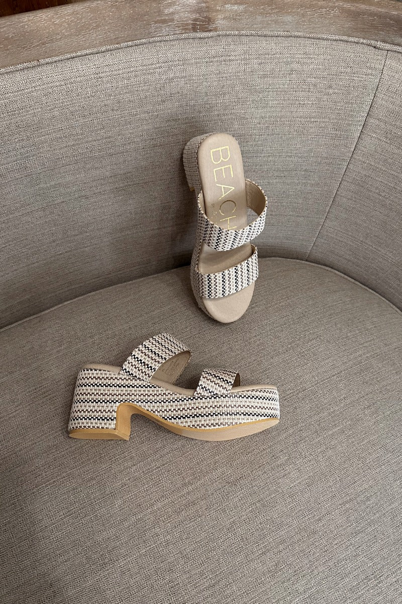 Front lay view of the Ocean Ave Platform Sandal in Ivory Mosaic which  features ivory, natural and brown knit fabric, two straps, slide-on style, monochrome platform sole and block heel.